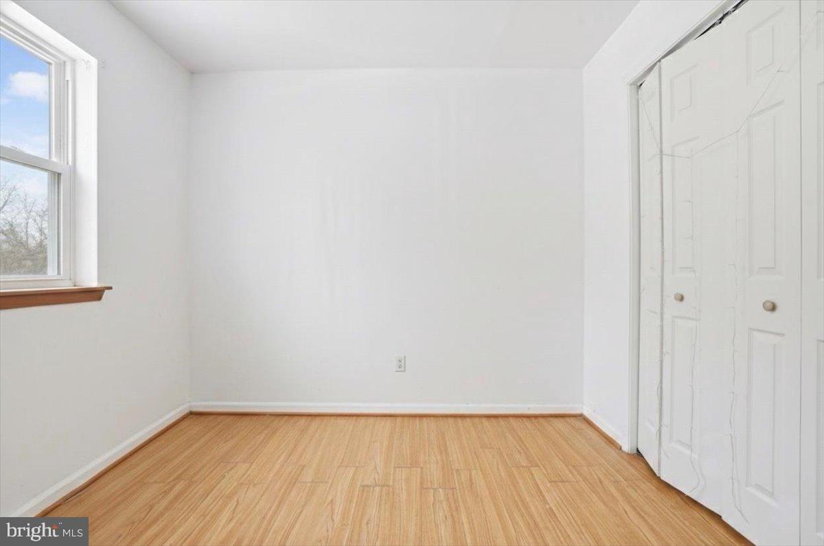 3301 Windemere Drive Bushkill, PA 18324 - Photo 33 of 70 a view of an empty room with wooden floor and a window