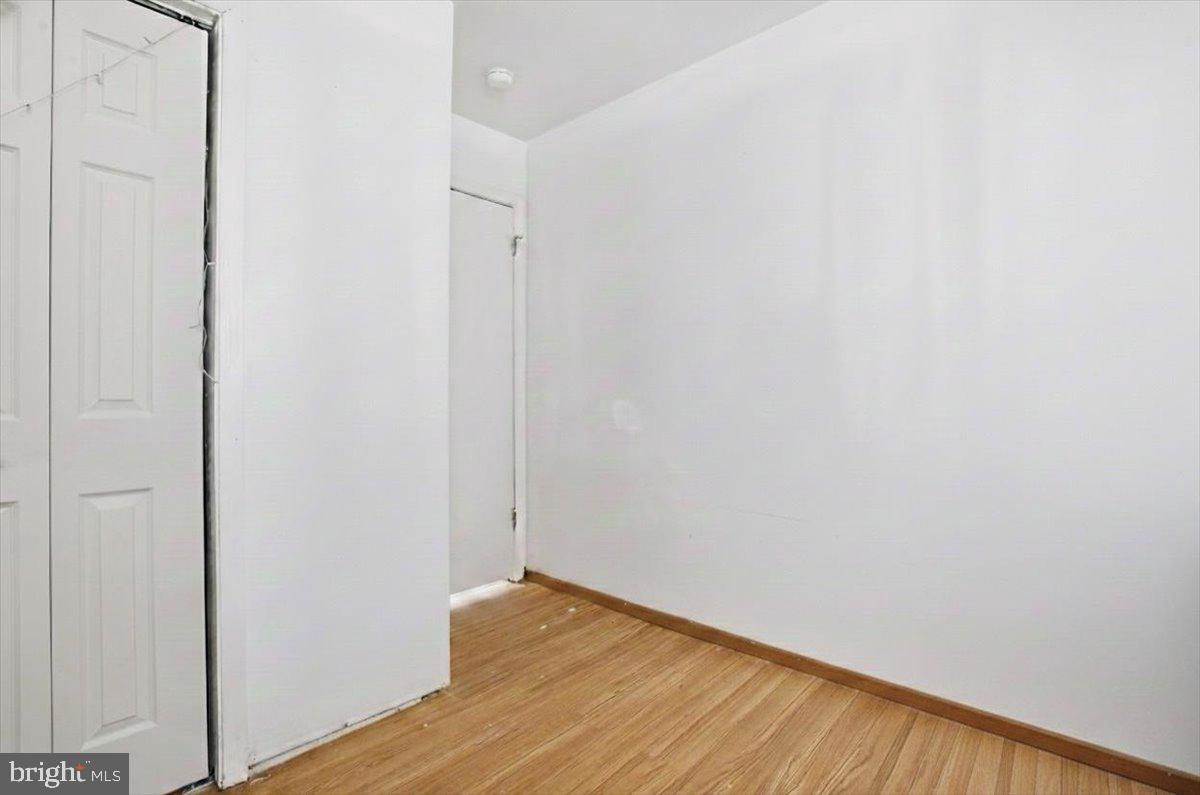 3301 Windemere Drive Bushkill, PA 18324 - Photo 34 of 70 a view of an empty room with wooden floor