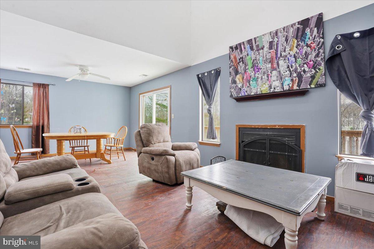 3301 Windemere Drive Bushkill, PA 18324 - Photo 4 of 70 a living room with furniture a table and a large window