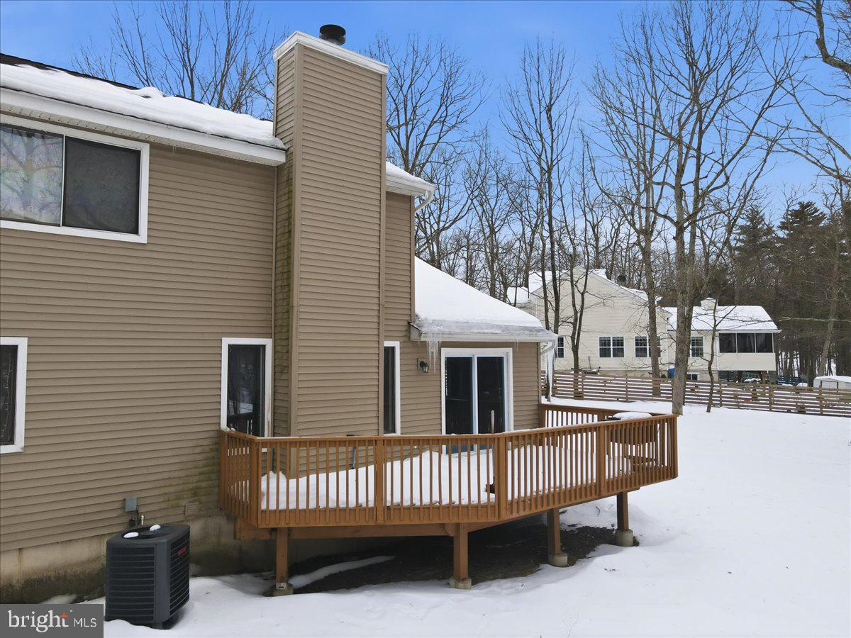 3301 Windemere Drive Bushkill, PA 18324 - Photo 41 of 70 a view of a house with a wooden roof deck