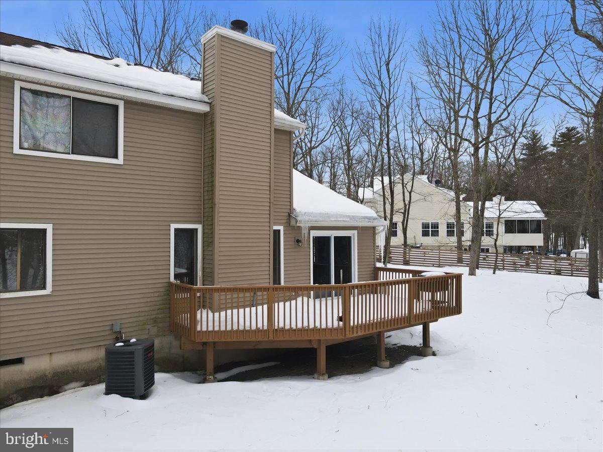 3301 Windemere Drive Bushkill, PA 18324 - Photo 42 of 70 a view of a house with a roof deck