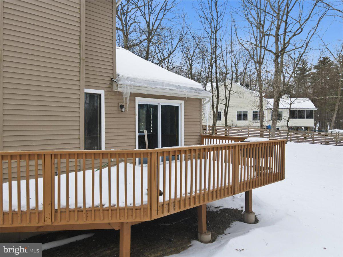 3301 Windemere Drive Bushkill, PA 18324 - Photo 45 of 70 a view of a brick house with a small yard