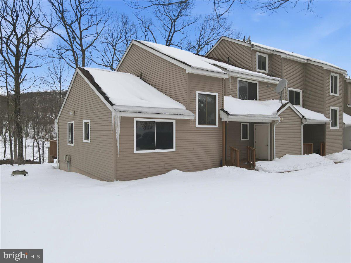 3301 Windemere Drive Bushkill, PA 18324 - Photo 54 of 70 a front view of a house with a yard