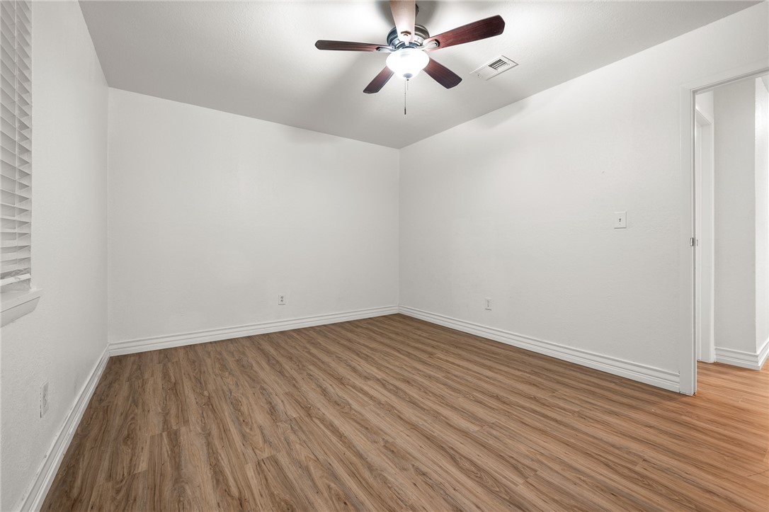 2551 Poinsetta Place Ingleside, TX 78362 - Photo 10 of 21 wooden floor in an empty room