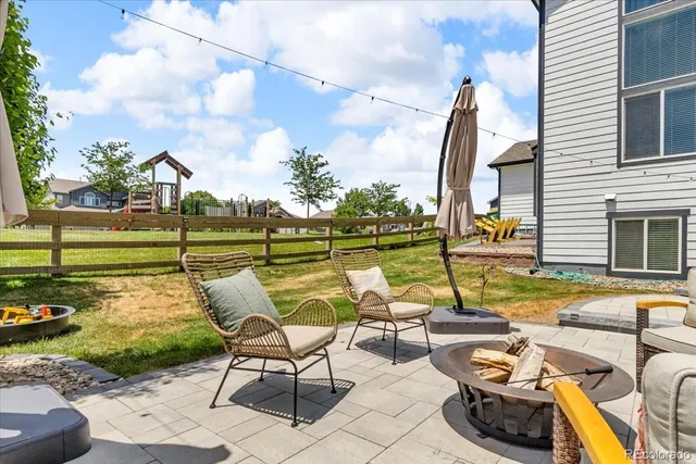 a view of a swimming pool with a lounge chairs