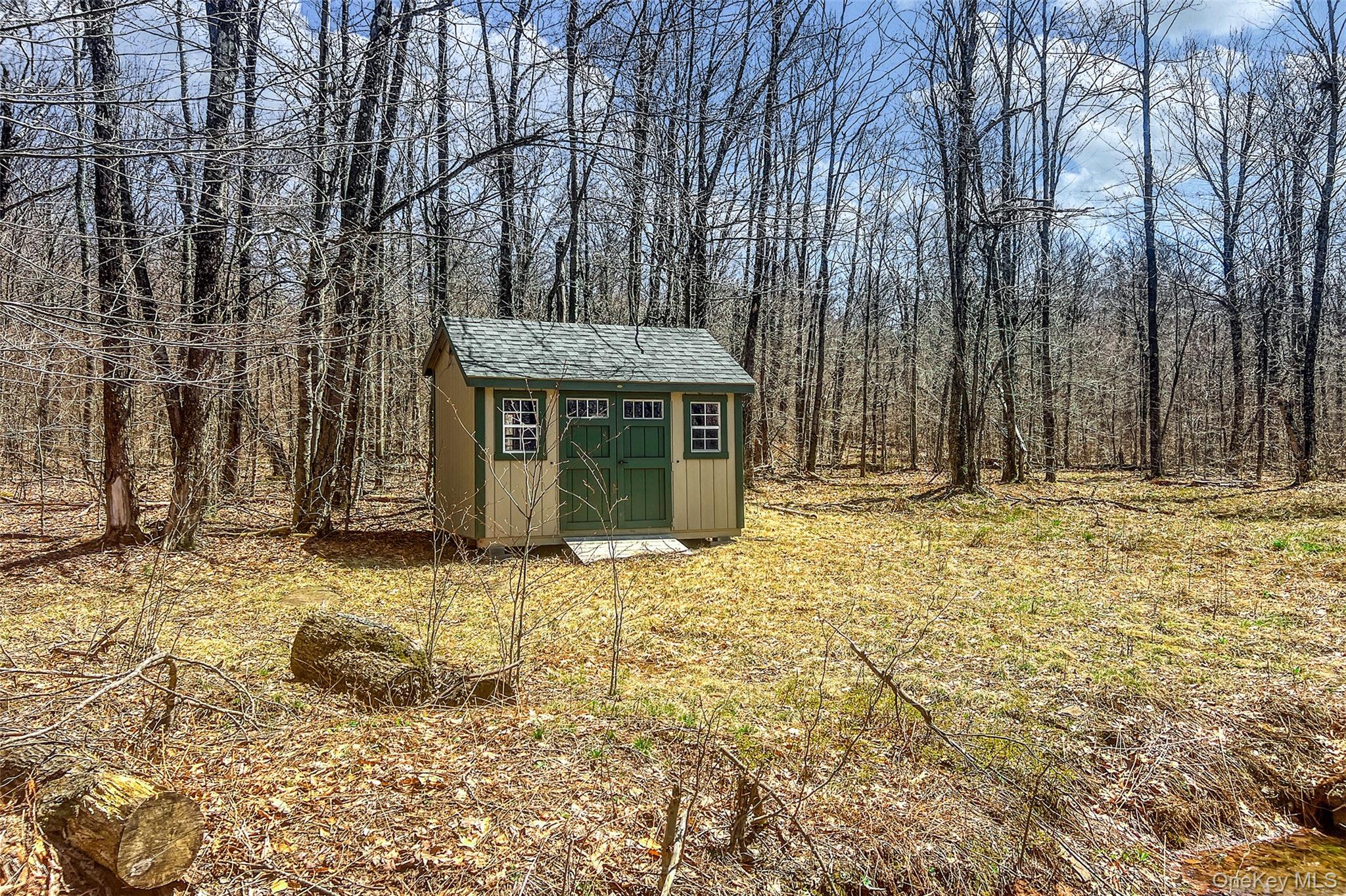 Frank Slawson Road Oneonta, NY 13820 - Photo 4 of 27 a front view of a house with a garden