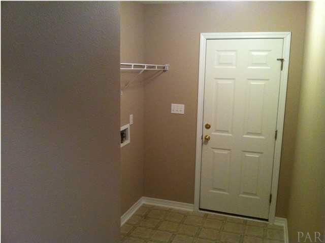 6680 Da Lisa Road Milton, FL 32583 - Photo 10 of 21 Laundry Room leading to garage