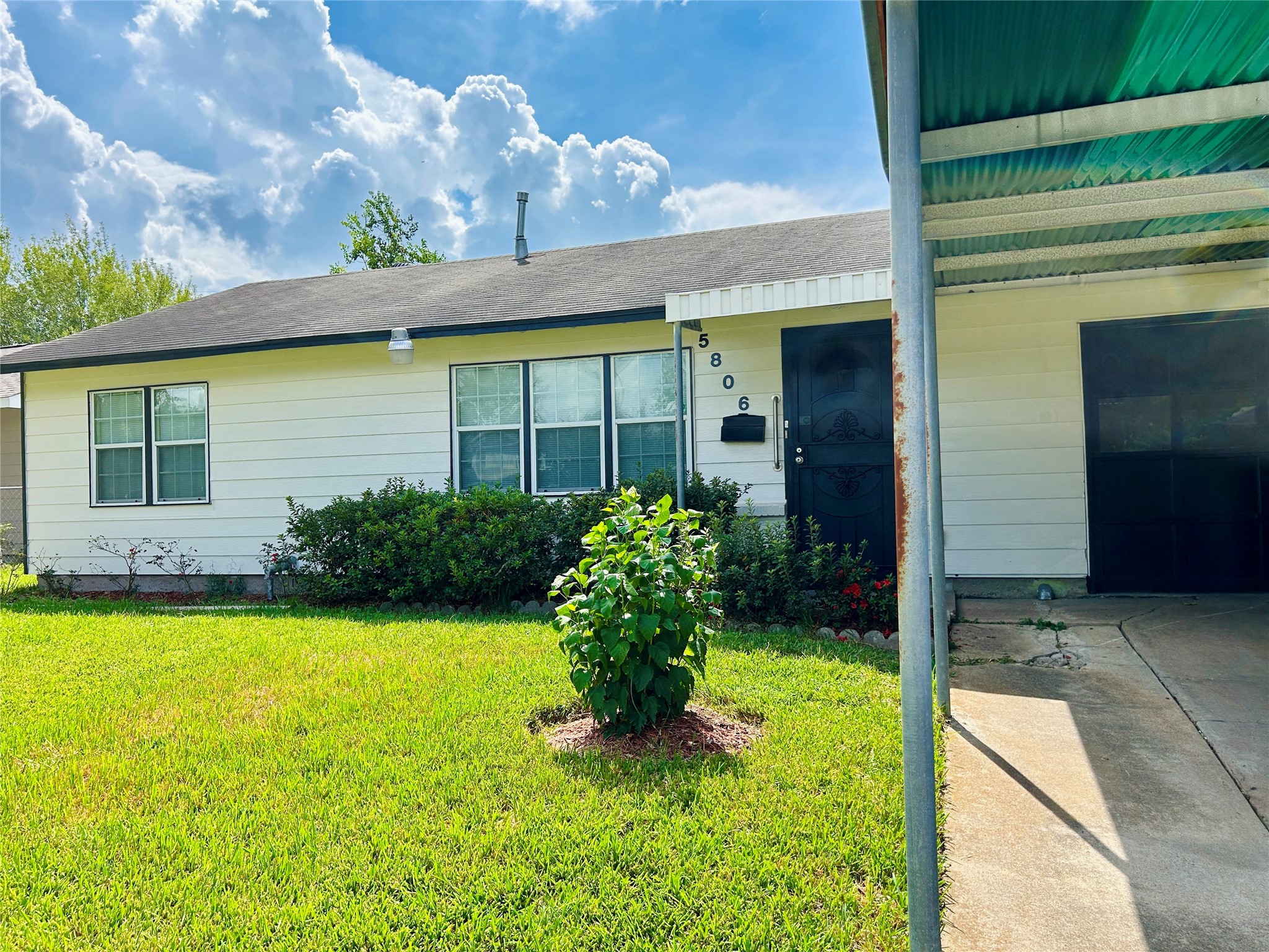 a view of a house with garden