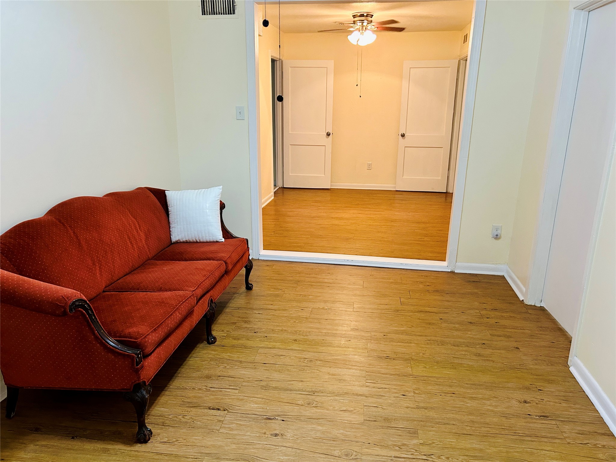 5806 Beldart Street Houston, TX 77033 - Photo 22 of 23 a living room with a couch