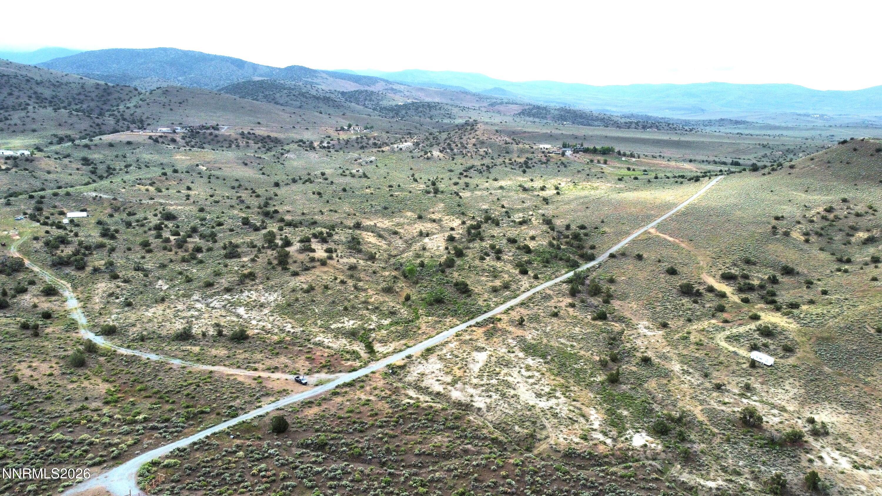 800 Hidden Canyon Road Reno, NV 89510 - Photo 8 of 9 800 Hidden Canyon Drone road shot Light
