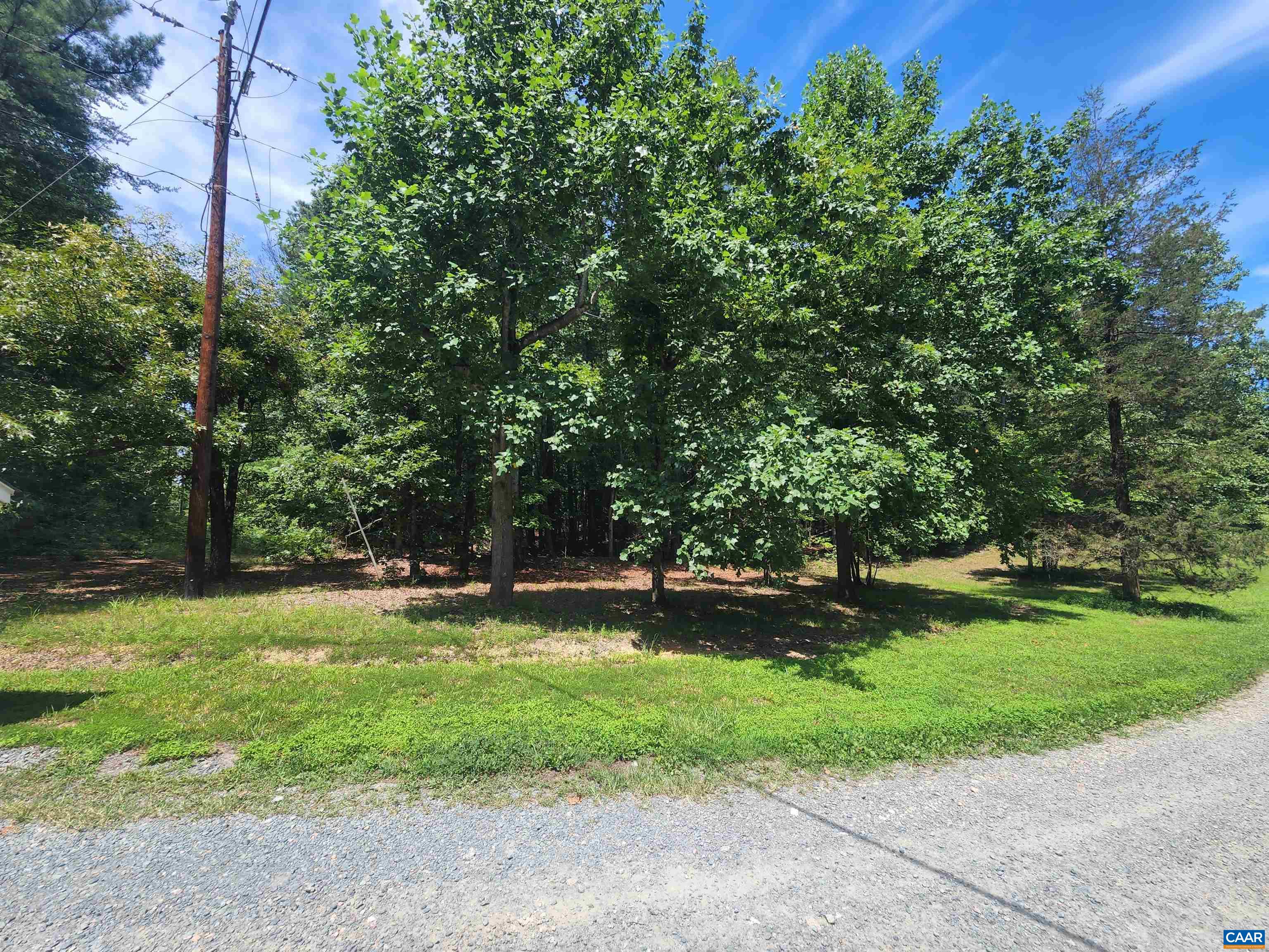 Lot 27 Martin Kings Road Charlottesville, VA 22902 - Photo 43 of 45 a backyard of a house with a yard and outdoor seating