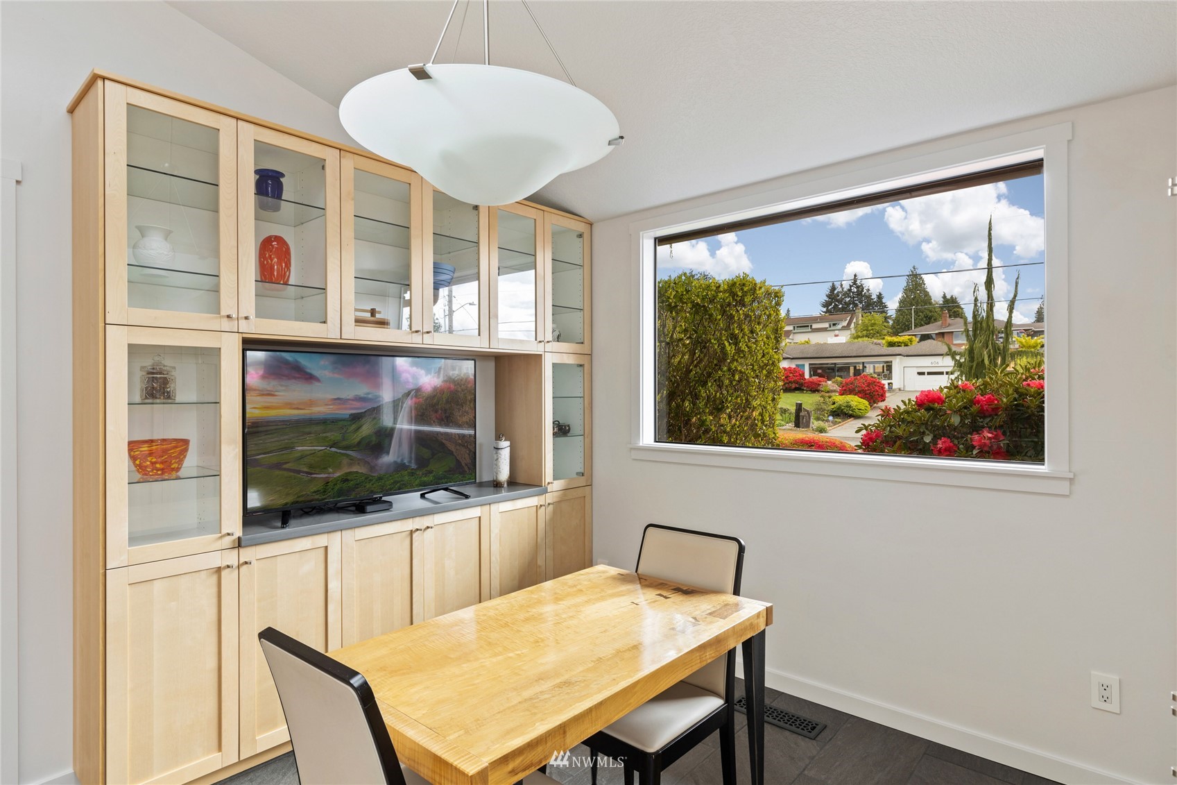 601 View Ridge Drive Everett, WA 98203 - Photo 11 of 38 a view of a dining room with furniture large windows and wooden floor
