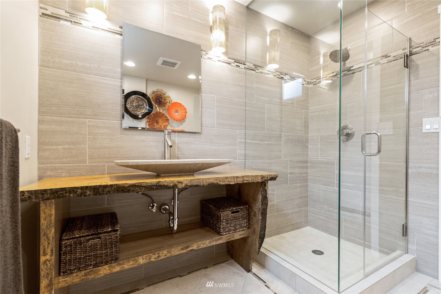 601 View Ridge Drive Everett, WA 98203 - Photo 18 of 38 a bathroom with a sink a mirror and a shower