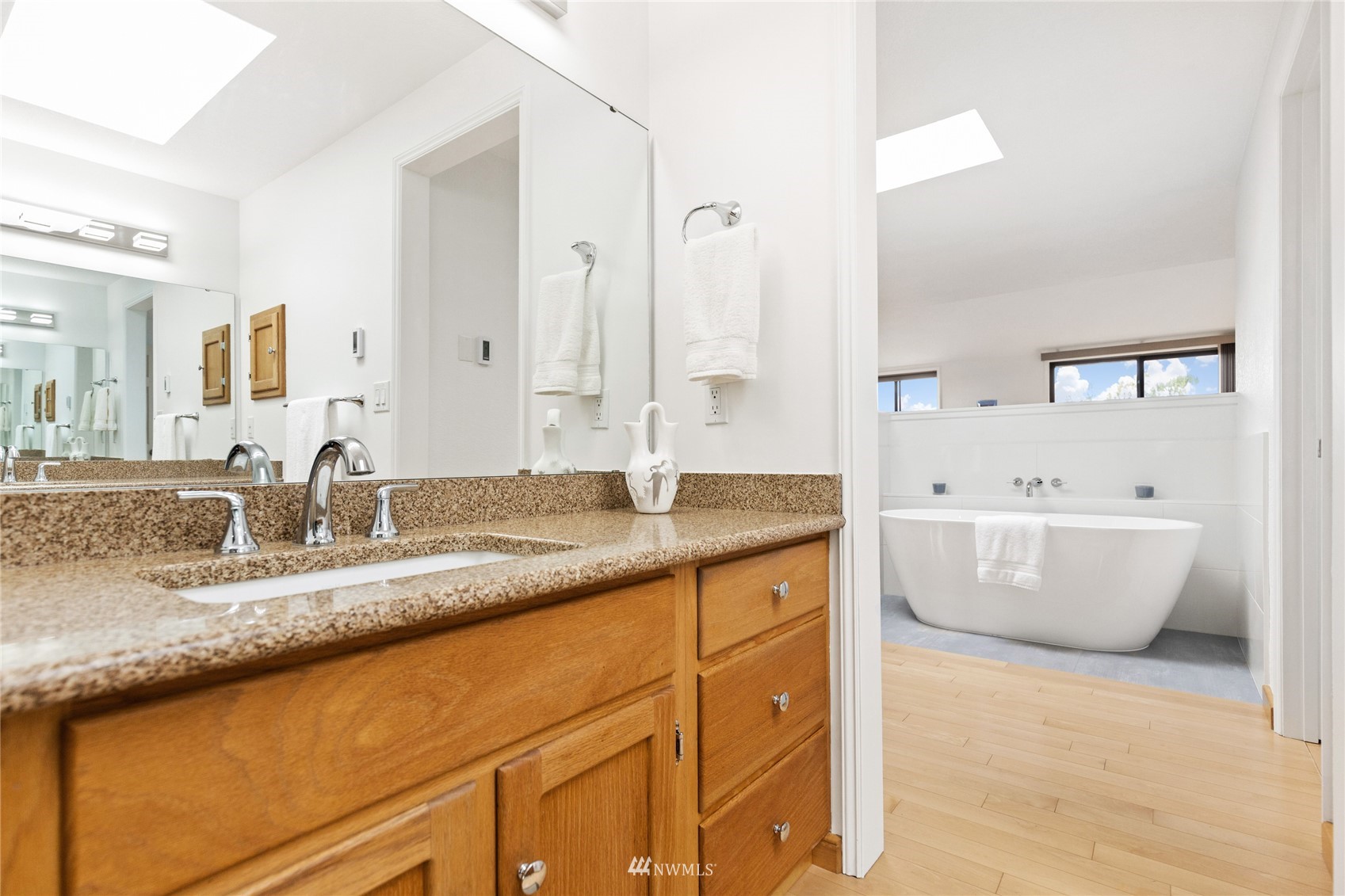 601 View Ridge Drive Everett, WA 98203 - Photo 23 of 38 a bathroom with a granite countertop sink and a mirror