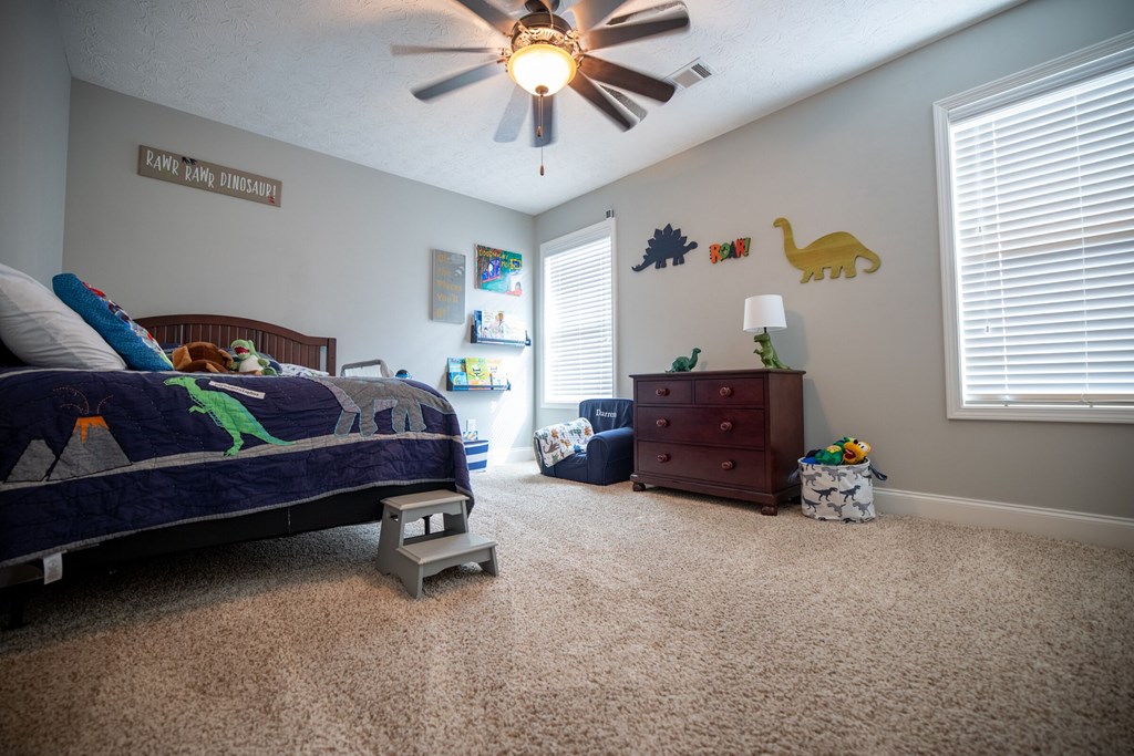 9660 Yellow Pine Road Midland, GA 31820 - Photo 20 of 27 a living room with furniture and a window