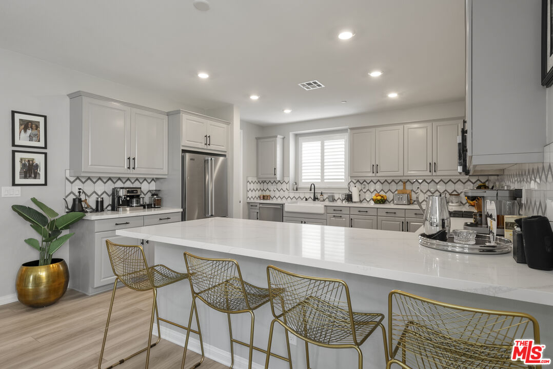 756 Daniel Freeman Circle Inglewood, CA 90301 - Photo 12 of 54 a kitchen with a table and chairs in it
