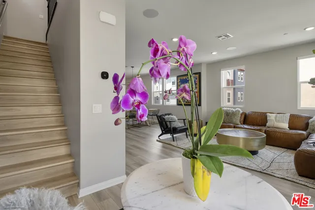 a living room with furniture and a couch