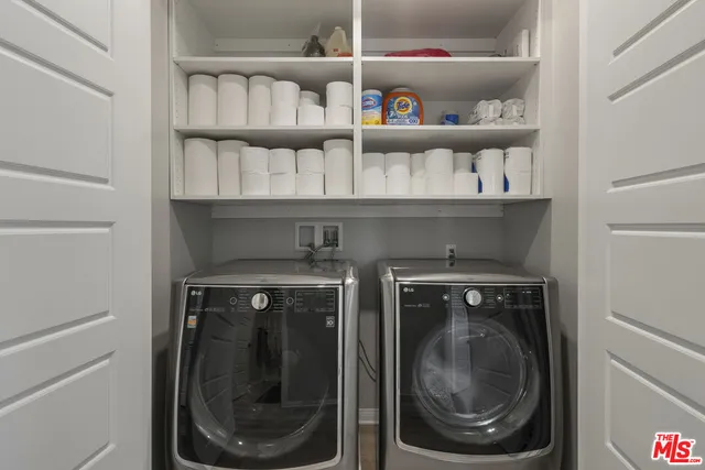 a view of washer and dryer in a shelf
