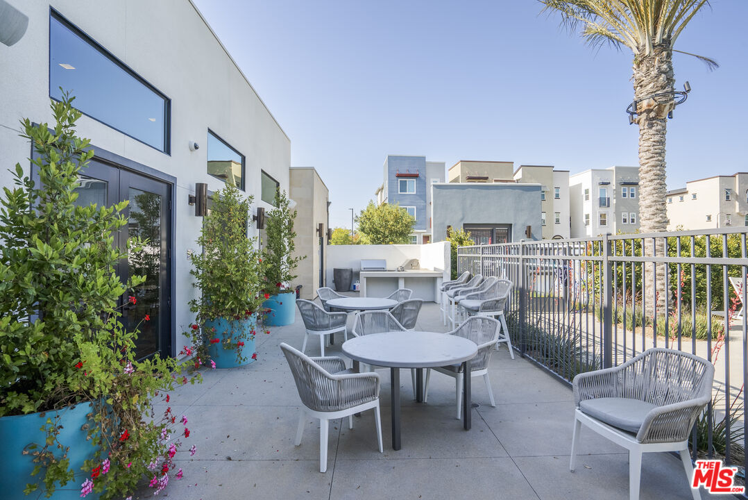 756 Daniel Freeman Circle Inglewood, CA 90301 - Photo 39 of 54 a balcony with furniture and potted plants