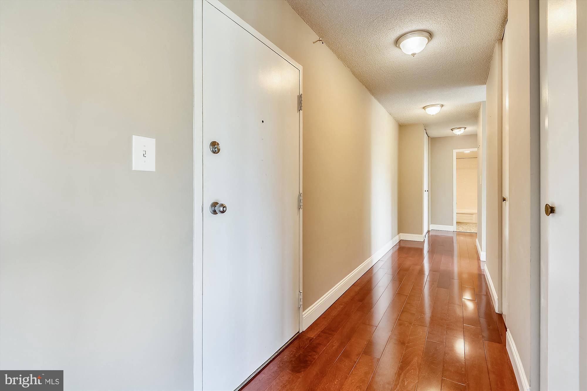 1301 South Arlington Ridge Road, Unit 401 Arlington, VA 22202 - Photo 5 of 30 Shining hardwood floors in living spaces
