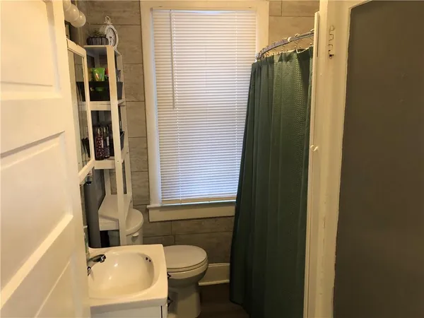 a bathroom with a bathtub and a sink