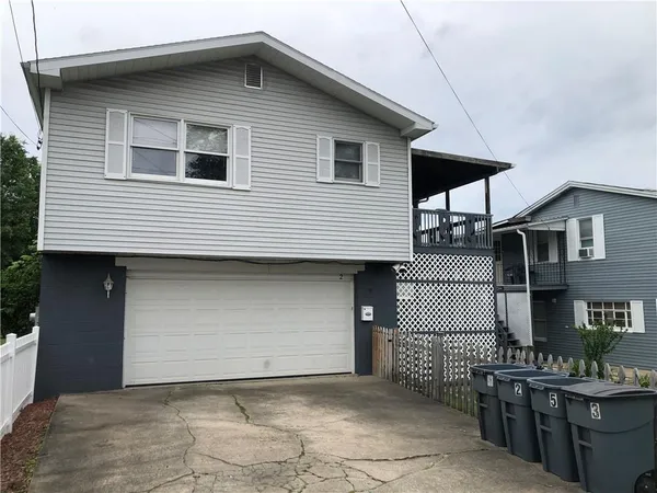 a front view of a house with entertaining space