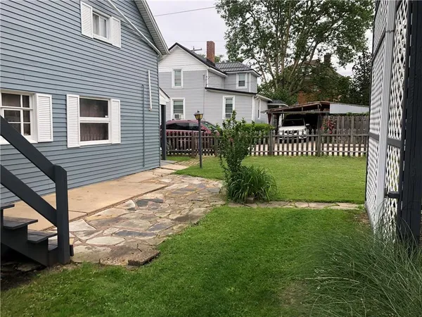 a view of a porch with a yard
