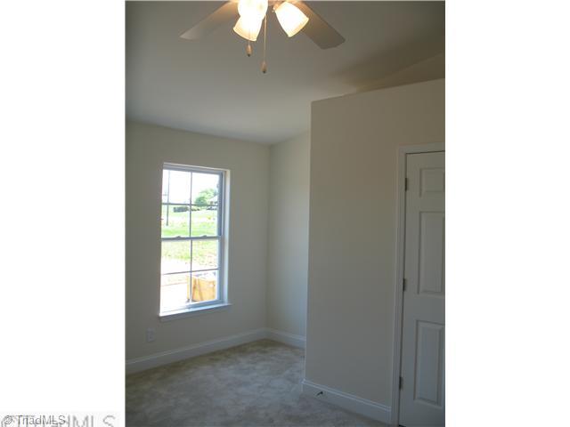 3768 Shadow Ridge Drive High Point, NC 27265 - Photo 7 of 10 Master Bedroom. Vaulted Ceiling w/Fan Light and Plant Shelves