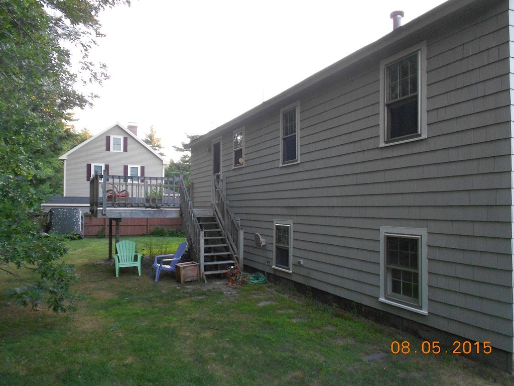 10 Virgo Lane Townsend, MA 01469 - Photo 12 of 14 a view of house with a yard and sitting area