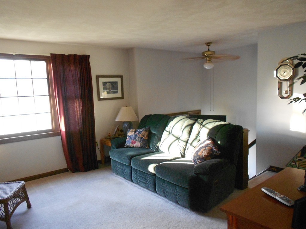 10 Virgo Lane Townsend, MA 01469 - Photo 2 of 14 a living room with furniture and a window