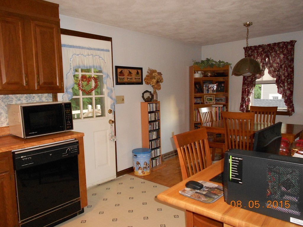 10 Virgo Lane Townsend, MA 01469 - Photo 8 of 14 a view of a livingroom with furniture and a fireplace