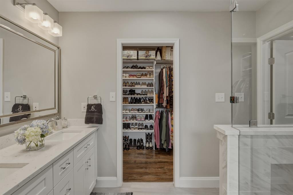 5914 Goodwin Avenue Dallas, TX 75206 - Photo 17 of 32 a kitchen with a refrigerator and cabinets