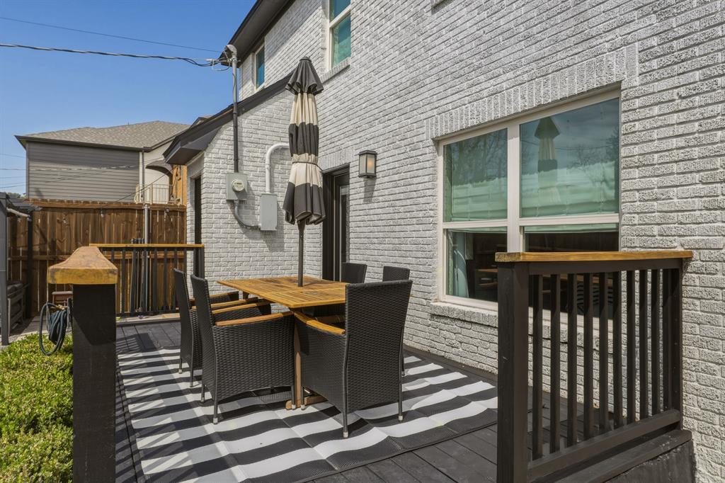 5914 Goodwin Avenue Dallas, TX 75206 - Photo 26 of 32 a view of balcony with a table and chairs
