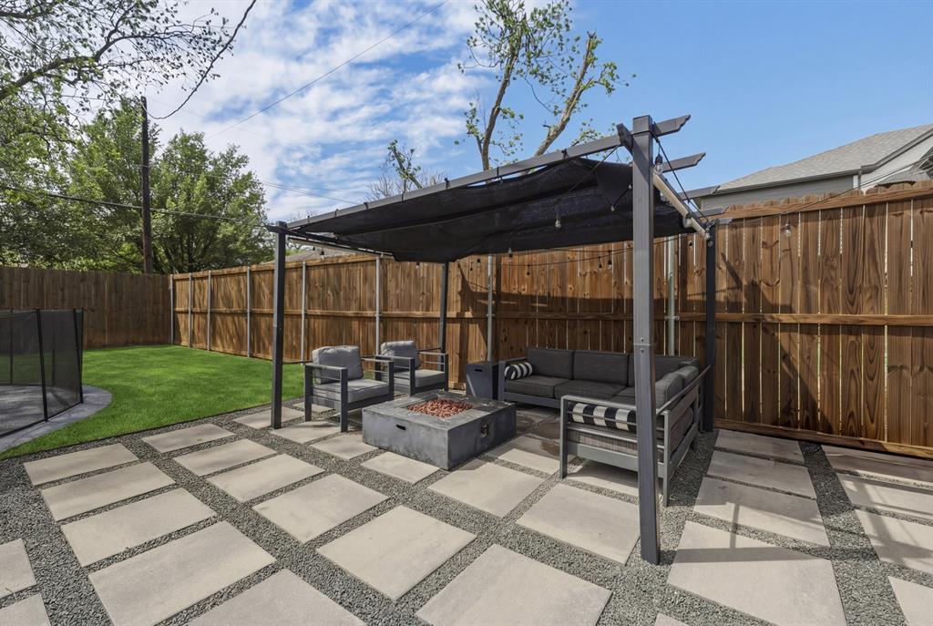 5914 Goodwin Avenue Dallas, TX 75206 - Photo 27 of 32 a view of backyard with sitting area