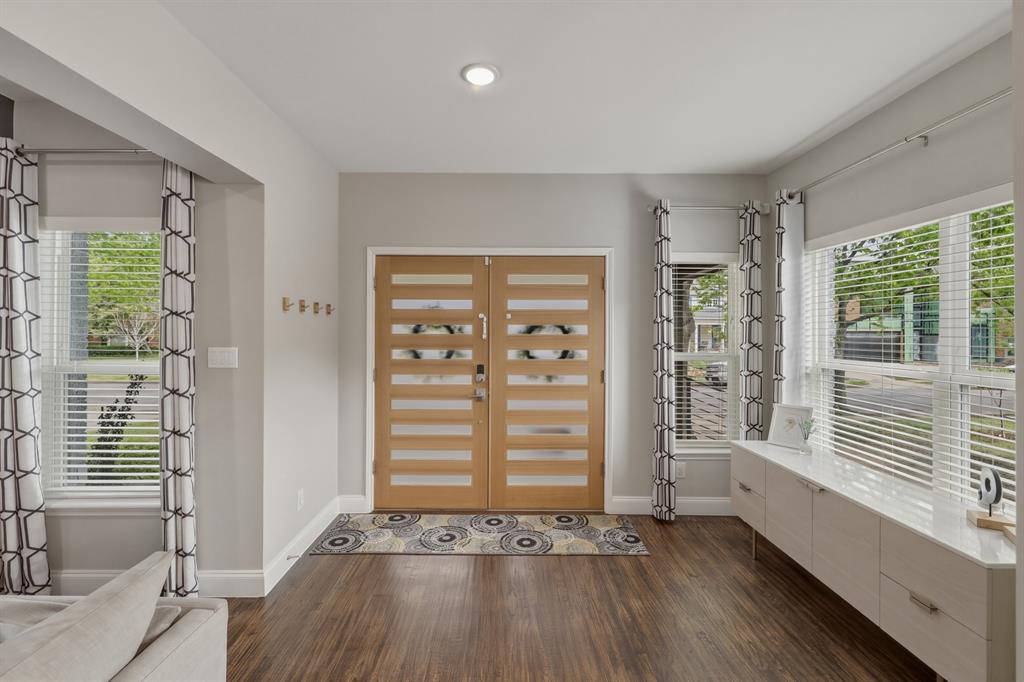5914 Goodwin Avenue Dallas, TX 75206 - Photo 3 of 32 a view of room with window wooden floor and front door