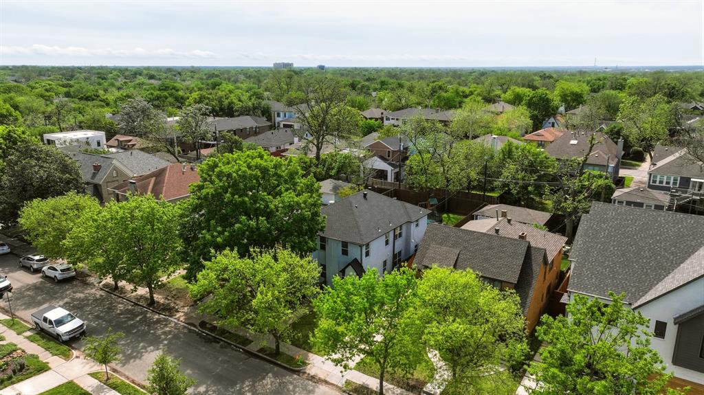 5914 Goodwin Avenue Dallas, TX 75206 - Photo 31 of 32 an aerial view of a house with yard and outdoor seating