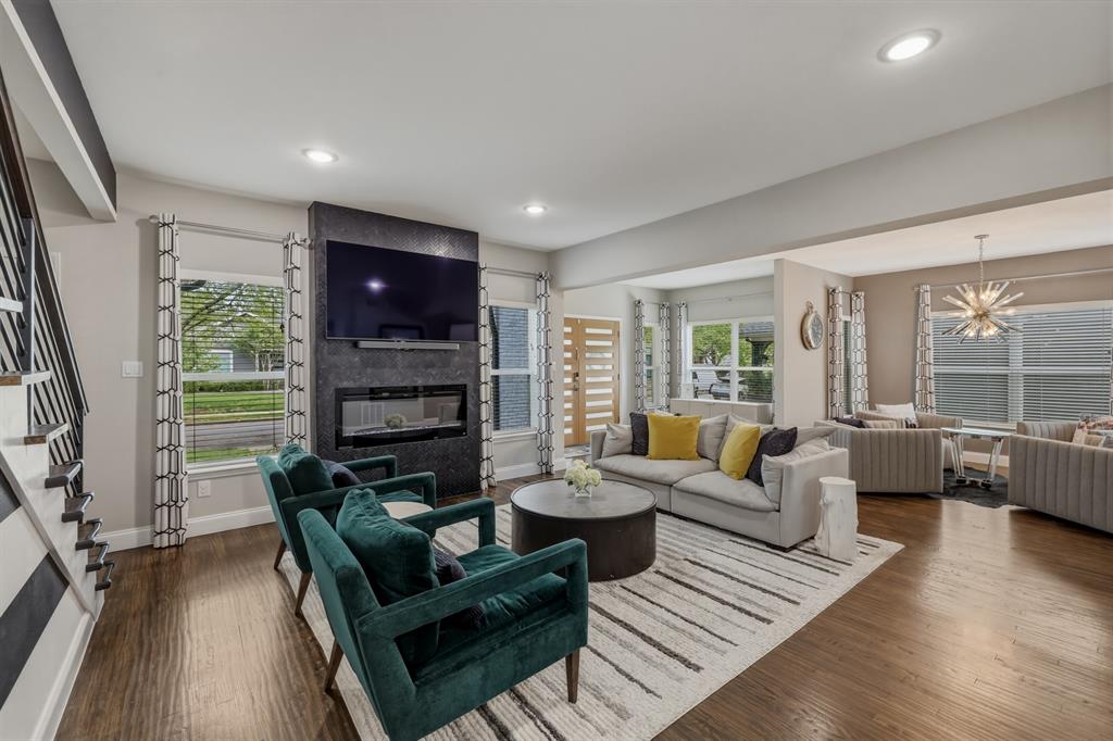 5914 Goodwin Avenue Dallas, TX 75206 - Photo 5 of 32 a living room with furniture and a flat screen tv