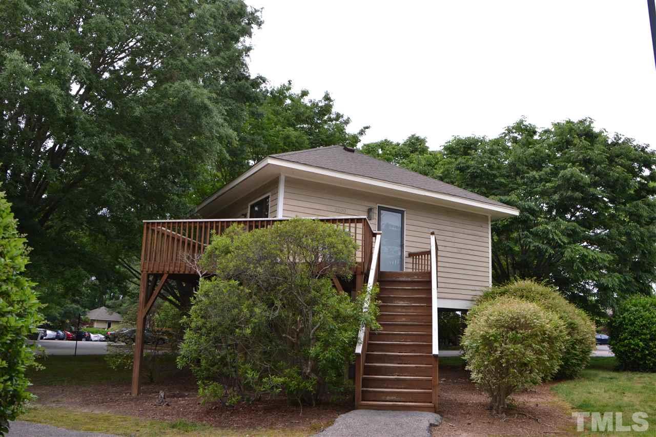 3500 Mill Run Raleigh, NC 27612 - Photo 1 of 8 a house with trees in the background