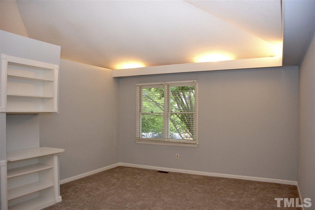 3500 Mill Run Raleigh, NC 27612 - Photo 3 of 8 a view of an empty room with a window