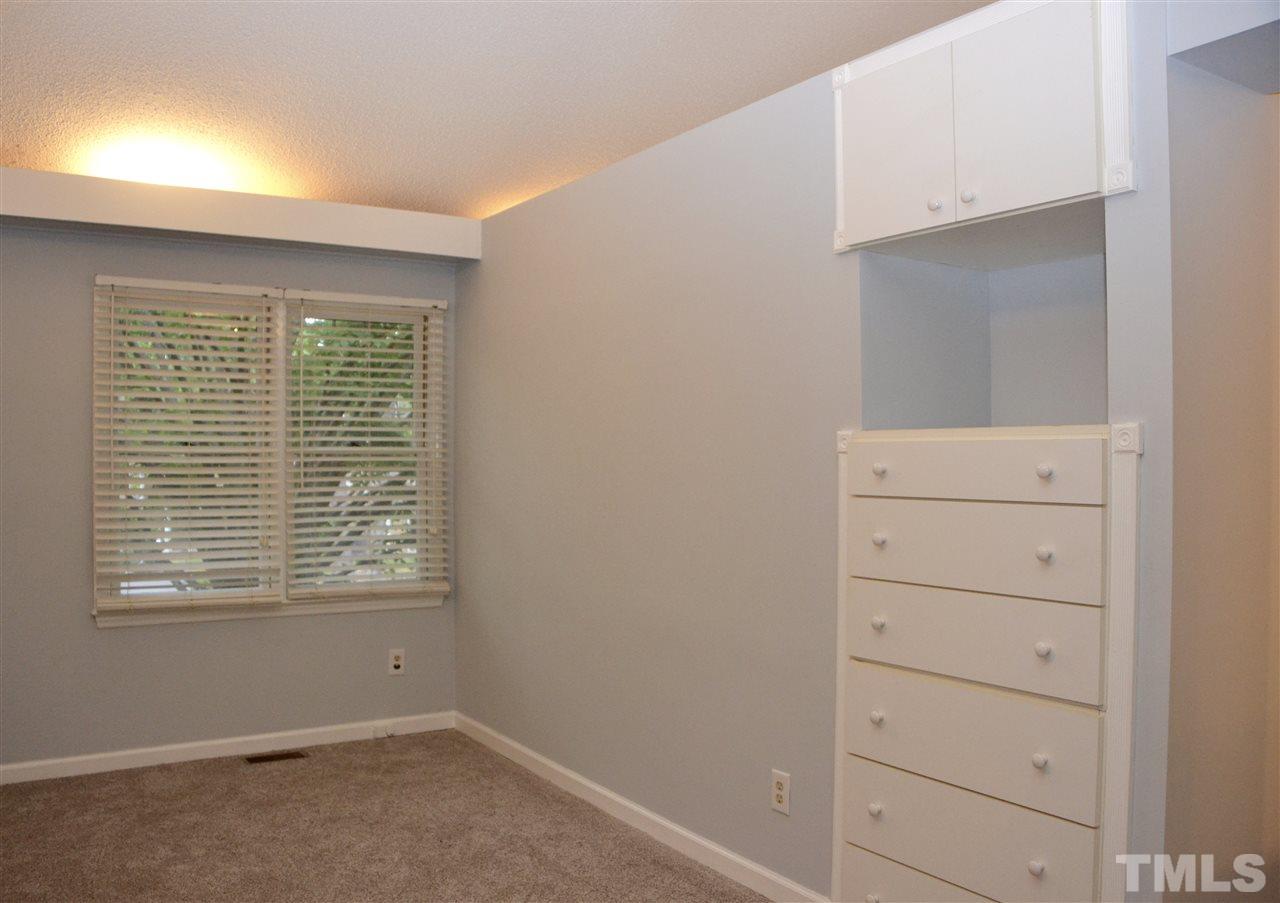 3500 Mill Run Raleigh, NC 27612 - Photo 8 of 8 a view of an empty room with cabinet