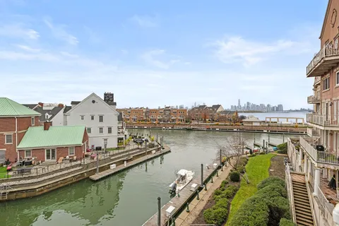 a view of a city and lake