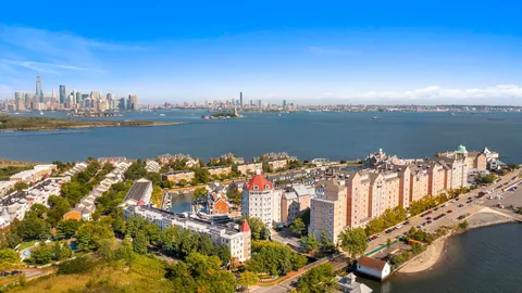 a view of a city with ocean view