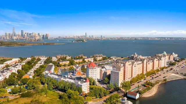 a view of a city with ocean view