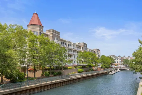 a view of a lake with a building in the background