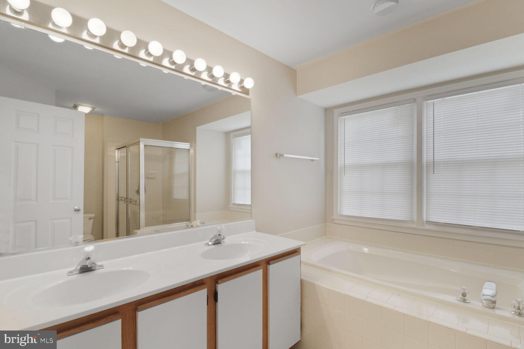 1924 North Daniel Street Arlington, VA 22201 - Photo 13 of 23 a bathroom with a sink double vanity and a mirror