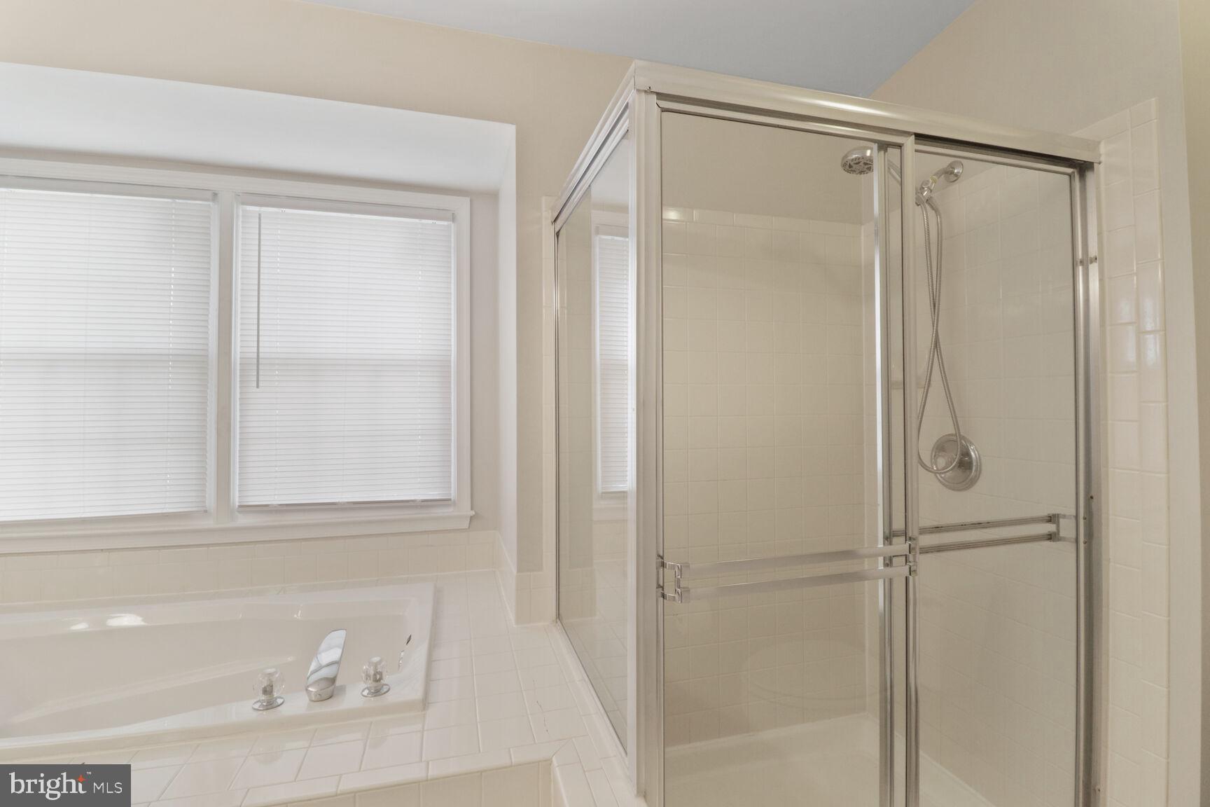 1924 North Daniel Street Arlington, VA 22201 - Photo 14 of 23 a bathroom with a bathtub and a shower