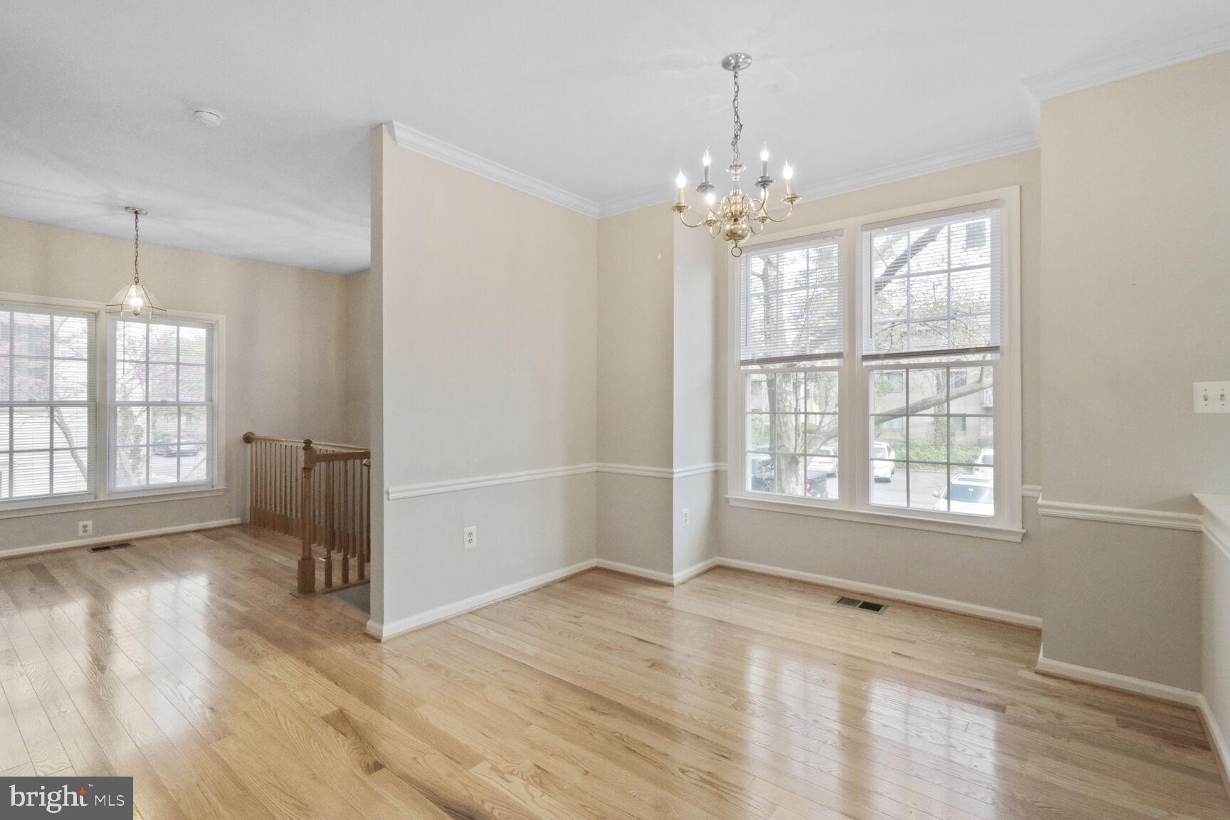 1924 North Daniel Street Arlington, VA 22201 - Photo 2 of 23 a view of an empty room with wooden floor and a window