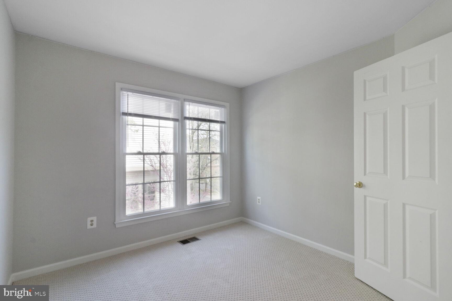 1924 North Daniel Street Arlington, VA 22201 - Photo 5 of 23 an empty room with windows
