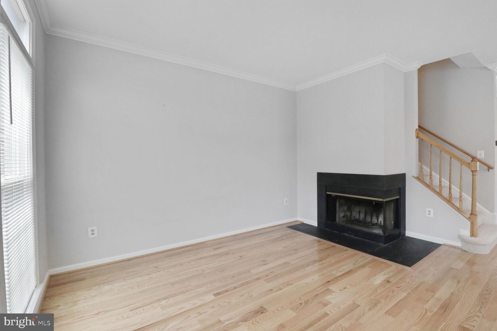 1924 North Daniel Street Arlington, VA 22201 - Photo 7 of 23 a room with a fireplace and a window