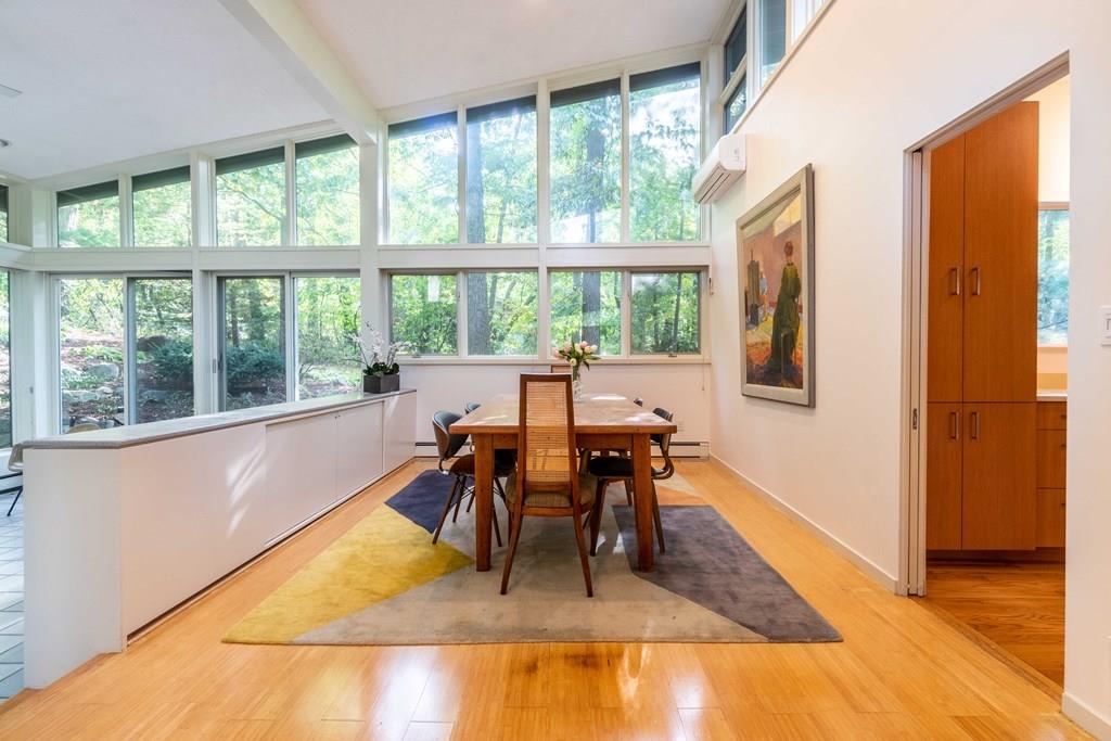 28 Peacock Farm Road Lexington, MA 02421 - Photo 11 of 29 a view of a dining room with furniture window and outside view